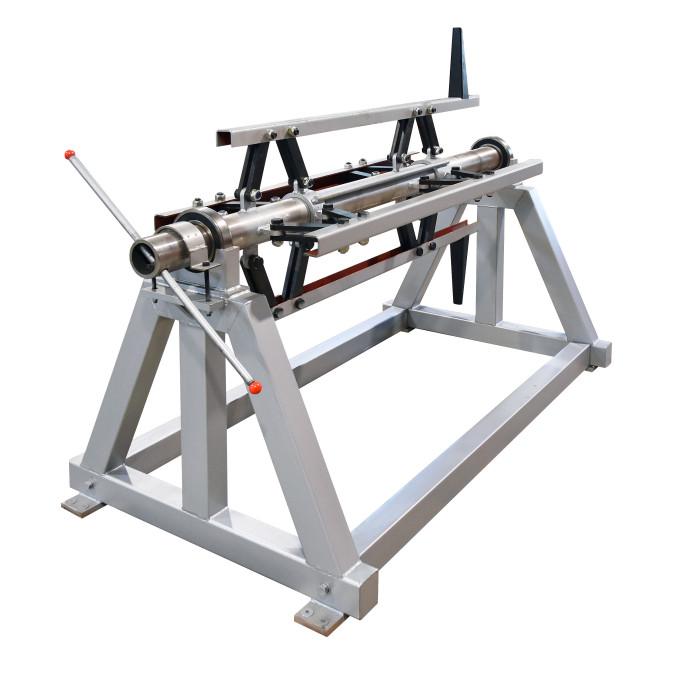 Metal coil unwinder and decoiler for roofing panel production